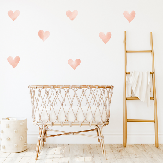 A series of peach heart-shaped wall decals. Non-toxic, eco-friendly, reusable wall stickers. Australian made.